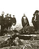 Burying the dead. Photograph dated 1904